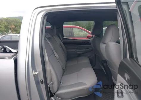 2014 Toyota Tacoma Base V6 z USA, uszkodzony, nr VIN 3TMMU4FN9EM064381